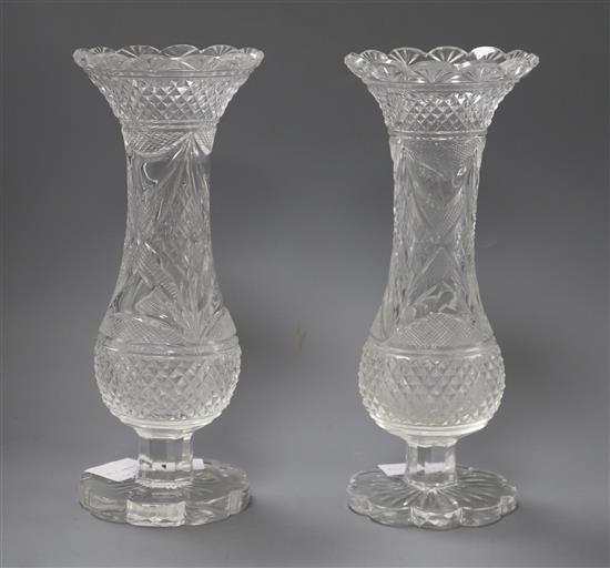A pair of Edwardian baluster pineapple cut glass vases height 28cm